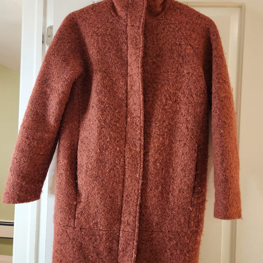 Minimum knee length wool coat.